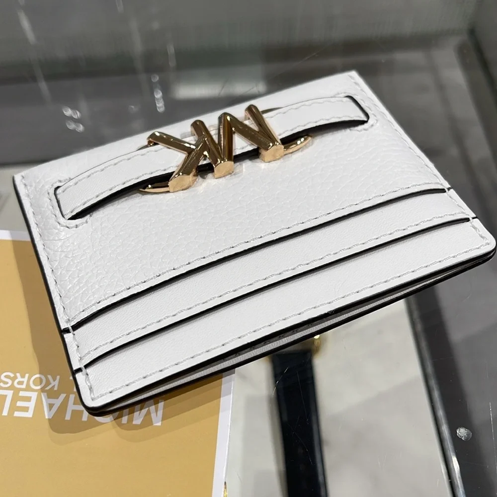 MICHAEL KORS
Reed Large Pebbled Leather Card Holder Case
Optic White 
NWT - Picture 9 of 16